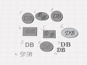 Set manžetových knoflíčků a spon na kravatu s rytinou monogramu DB vyrobené na zakázku