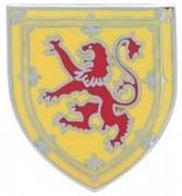Žluto červený odznak do klopy skotský lev